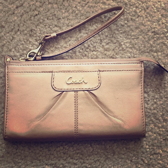 Coach Handbags - Rosé gold Coach wristlet